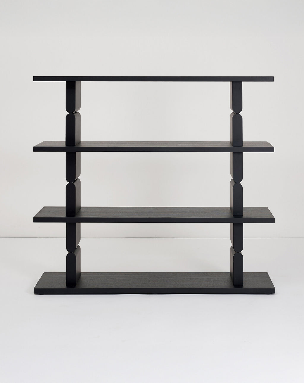 Bookshelves coloured wood noon